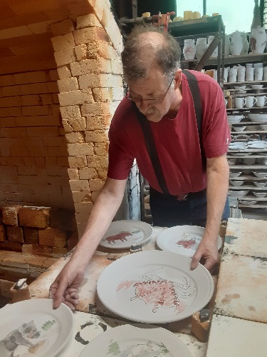 Frank Gosar loading a kiln