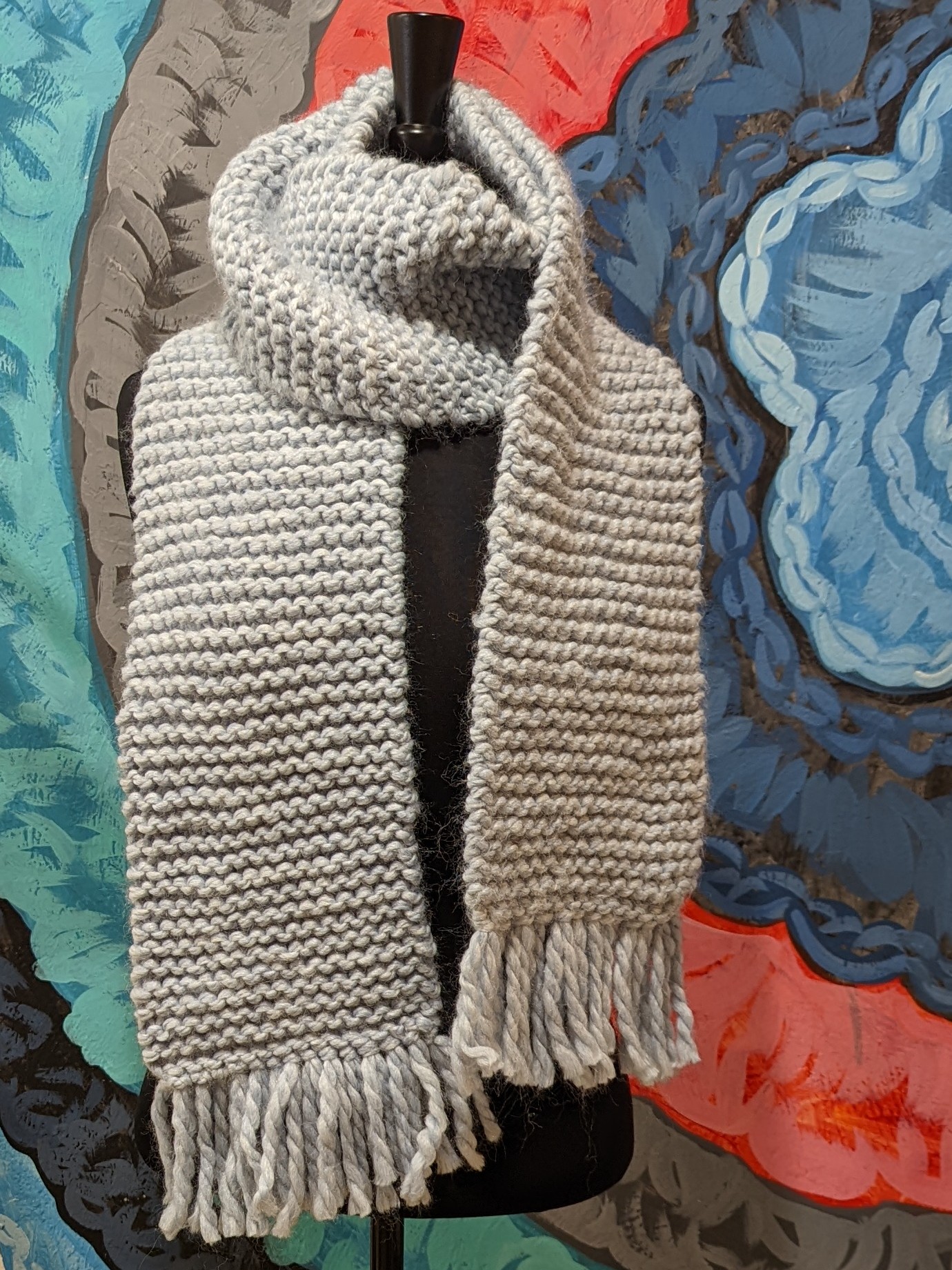 Knit scarf on mannequin. 