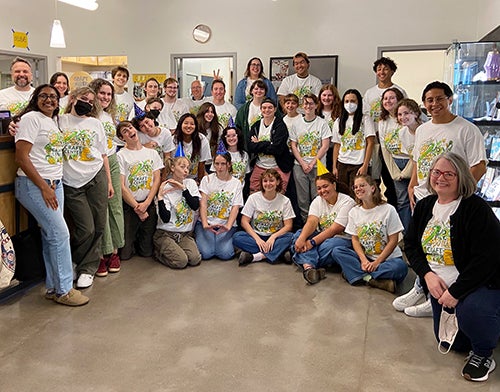 Craft Center staff in a group photo at the Craft Center reception area. 