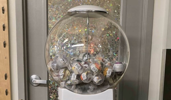 The craft-related prizes inside the gumball machine in the lobby.